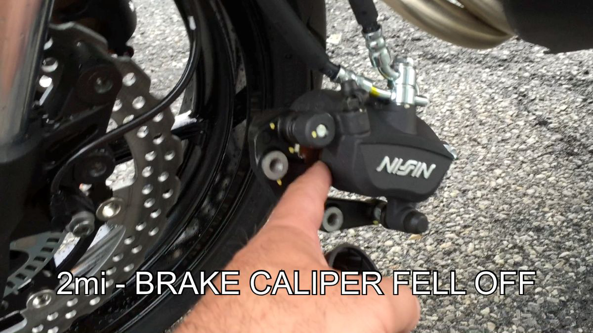 Brand new Kawasaki Versys 650 with brake caliper hanging after it fell off on the first ride