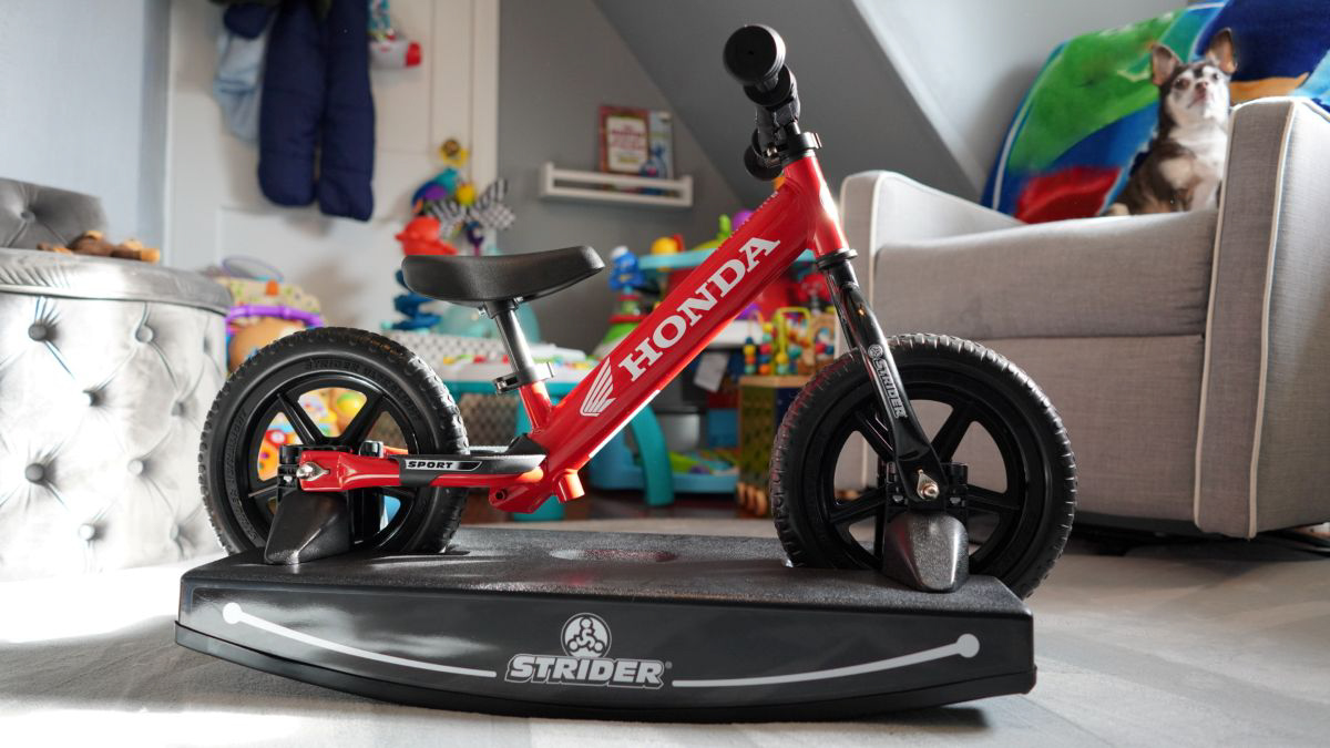 Strider balance bike on rocking base